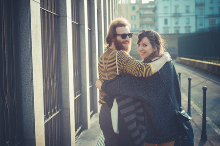 young modern stylish couple urban city outdoorsの写真素材