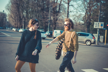 young modern stylish couple urban city outdoorsの写真素材