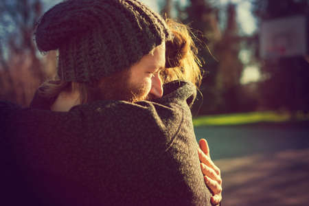 young couple in love lifestyle outdoor at the park