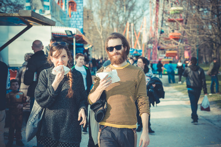 young modern stylish couple urban city outdoorsの写真素材
