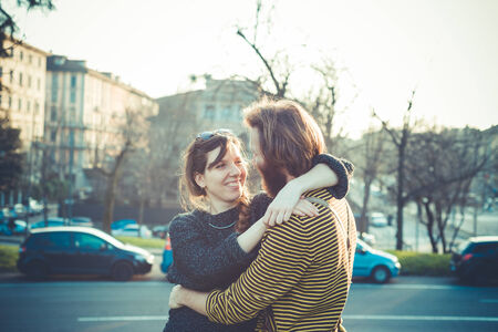 young modern stylish couple urban city outdoorsの写真素材