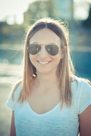 young beautiful woman in the cityの写真素材