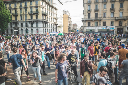 MILAN, ITALY - MAY 1: labor day held in Milan on May 1, 2014. Every year thousands of people taking to the streets to celebrate labor day and to protest against italian austerityのeditorial素材