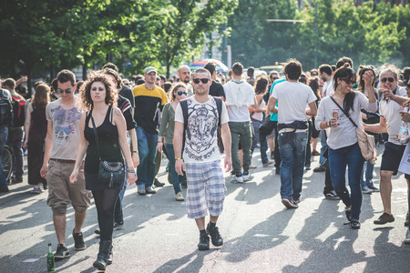 MILAN, ITALY - MAY 1: labor day held in Milan on May 1, 2014. Every year thousands of people taking to the streets to celebrate labor day and to protest against italian austerityのeditorial素材