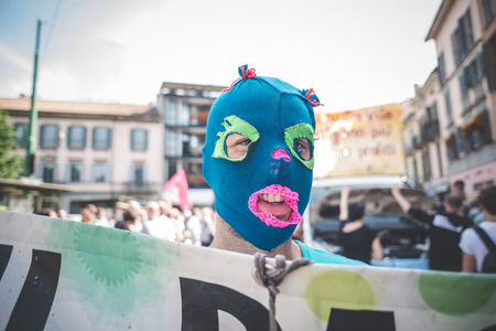 MILAN, ITALY - MAY 1: labor day held in Milan on May 1, 2014. Every year thousands of people taking to the streets to celebrate labor day and to protest against italian austerityのeditorial素材