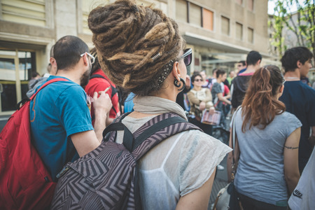 MILAN, ITALY - MAY 1: labor day held in Milan on May 1, 2014. Every year thousands of people taking to the streets to celebrate labor day and to protest against italian austerityのeditorial素材