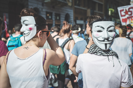 MILAN, ITALY - MAY 1: labor day held in Milan on May 1, 2014. Every year thousands of people taking to the streets to celebrate labor day and to protest against italian austerityのeditorial素材