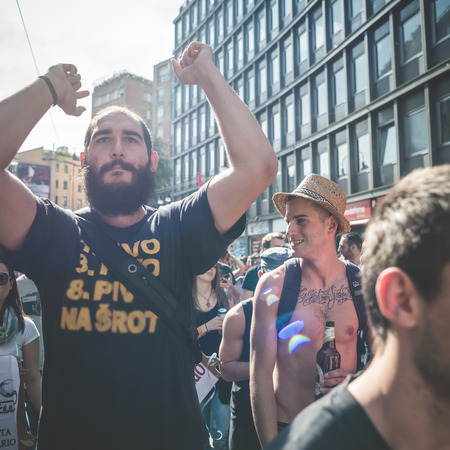 MILAN, ITALY - MAY 1: labor day held in Milan on May 1, 2014. Every year thousands of people taking to the streets to celebrate labor day and to protest against italian austerityのeditorial素材