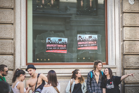 MILAN, ITALY - MAY 1: labor day held in Milan on May 1, 2014. Every year thousands of people taking to the streets to celebrate labor day and to protest against italian austerityのeditorial素材