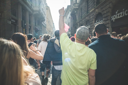 MILAN, ITALY - MAY 1: labor day held in Milan on May 1, 2014. Every year thousands of people taking to the streets to celebrate labor day and to protest against italian austerityのeditorial素材