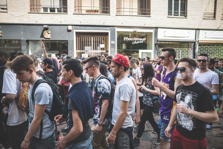MILAN, ITALY - MAY 1: labor day held in Milan on May 1, 2014. Every year thousands of people taking to the streets to celebrate labor day and to protest against italian austerityのeditorial素材