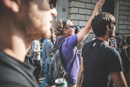 MILAN, ITALY - MAY 1: labor day held in Milan on May 1, 2014. Every year thousands of people taking to the streets to celebrate labor day and to protest against italian austerityのeditorial素材
