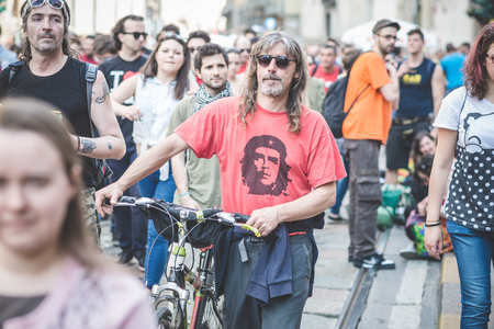 MILAN, ITALY - MAY 1: labor day held in Milan on May 1, 2014. Every year thousands of people taking to the streets to celebrate labor day and to protest against italian austerityのeditorial素材