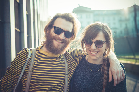 young modern stylish couple urban city outdoorsの写真素材