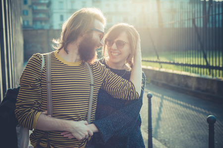 young modern stylish couple urban city outdoorsの写真素材
