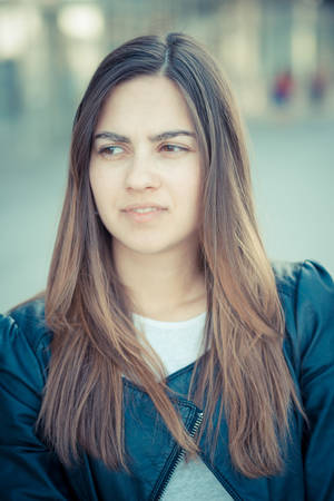 young beautiful woman in the cityの写真素材