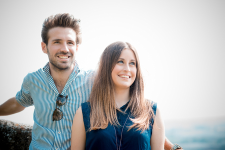 young beautiful couple lovers outdoorsの写真素材