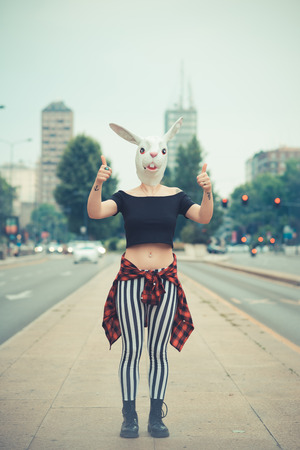 rabbit mask woman in the cityの写真素材