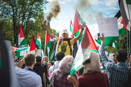 MILAN, ITALY - JULY 26: Pro Palestine manifestation held in Milan on July, 26 2014. People took to the streets to claim  Gaza and Palestine freedom against israel war and bombingのeditorial素材