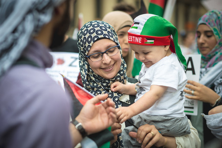 MILAN, ITALY - JULY 26: Pro Palestine manifestation held in Milan on July, 26 2014. People took to the streets to claim  Gaza and Palestine freedom against israel war and bombingのeditorial素材