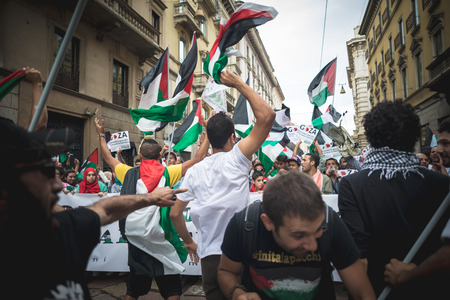 MILAN, ITALY - JULY 26: Pro Palestine manifestation held in Milan on July, 26 2014. People took to the streets to claim  Gaza and Palestine freedom against israel war and bombingのeditorial素材