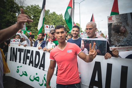 MILAN, ITALY - JULY 26: Pro Palestine manifestation held in Milan on July, 26 2014. People took to the streets to claim  Gaza and Palestine freedom against israel war and bombingのeditorial素材