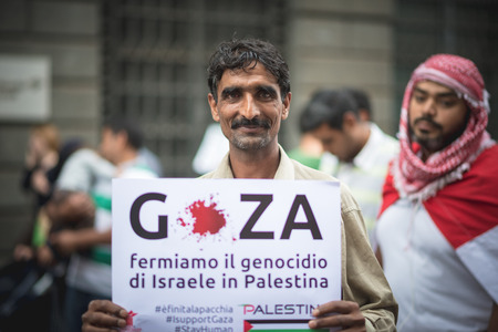 MILAN, ITALY - JULY 26: Pro Palestine manifestation held in Milan on July, 26 2014. People took to the streets to claim  Gaza and Palestine freedom against israel war and bombingのeditorial素材