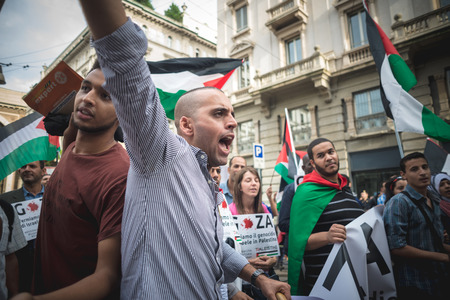 MILAN, ITALY - JULY 26: Pro Palestine manifestation held in Milan on July, 26 2014. People took to the streets to claim  Gaza and Palestine freedom against israel war and bombingのeditorial素材