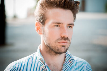 young handsome hipster modern man outdoor in summertimeの写真素材