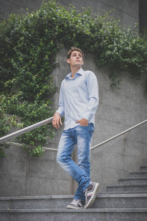 young model hansome blonde man in the city