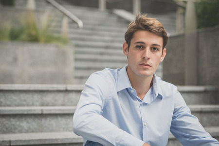 young model hansome blonde man in the city