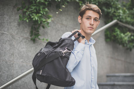 young model hansome blonde man in the city