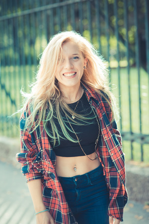 beautiful young blonde hair woman hipster in the cityの写真素材