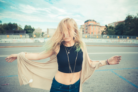 beautiful young blonde hair woman hipster in the cityの写真素材