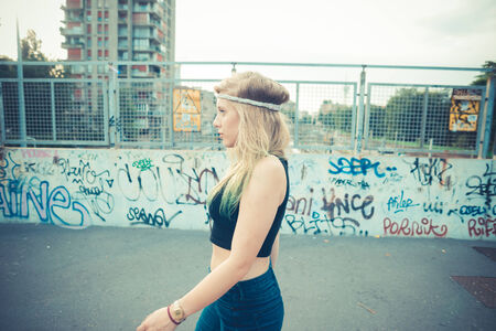 beautiful young blonde hair woman hipster in the cityのeditorial素材
