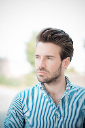 young handsome hipster modern man outdoor in summertimeの写真素材