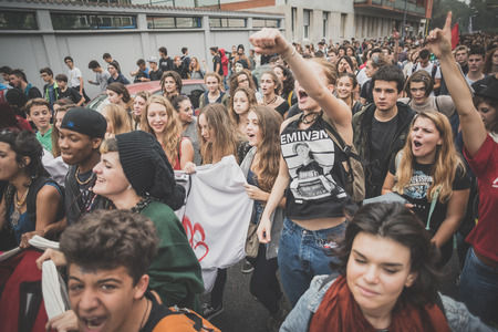 MILAN, ITALY - OCTOBER 10: Students manifestation held in Milan on October, 10 2014. Students took to the streets to protest against school italian reform and against milan expoのeditorial素材