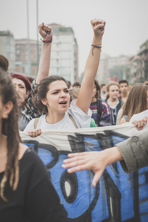 MILAN, ITALY - OCTOBER 10: Students manifestation held in Milan on October, 10 2014. Students took to the streets to protest against school italian reform and against milan expoのeditorial素材