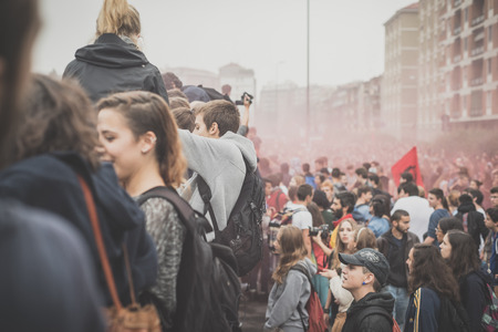 MILAN, ITALY - OCTOBER 10: Students manifestation held in Milan on October, 10 2014. Students took to the streets to protest against school italian reform and against milan expoのeditorial素材