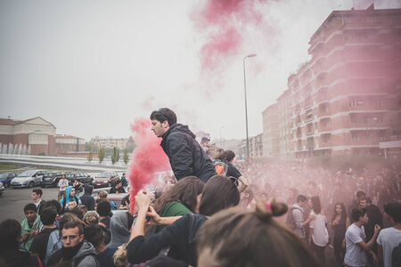 MILAN, ITALY - OCTOBER 10: Students manifestation held in Milan on October, 10 2014. Students took to the streets to protest against school italian reform and against milan expoのeditorial素材