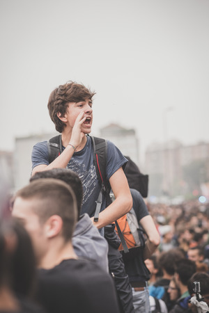 MILAN, ITALY - OCTOBER 10: Students manifestation held in Milan on October, 10 2014. Students took to the streets to protest against school italian reform and against milan expoのeditorial素材