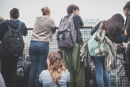 MILAN, ITALY - OCTOBER 10: Students manifestation held in Milan on October, 10 2014. Students took to the streets to protest against school italian reform and against milan expoのeditorial素材