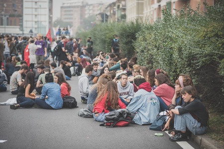 MILAN, ITALY - OCTOBER 10: Students manifestation held in Milan on October, 10 2014. Students took to the streets to protest against school italian reform and against milan expoのeditorial素材