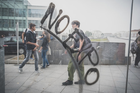 MILAN, ITALY - OCTOBER 10: Students manifestation held in Milan on October, 10 2014. Students took to the streets to protest against school italian reform and against milan expoのeditorial素材