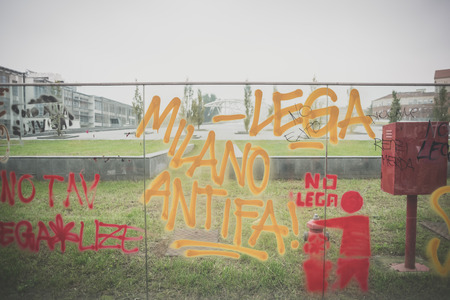 MILAN, ITALY - OCTOBER 10: Students manifestation held in Milan on October, 10 2014. Students took to the streets to protest against school italian reform and against milan expoのeditorial素材