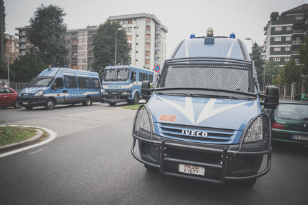 MILAN, ITALY - OCTOBER 10: Students manifestation held in Milan on October, 10 2014. police truck during student manifestation against school reformsのeditorial素材
