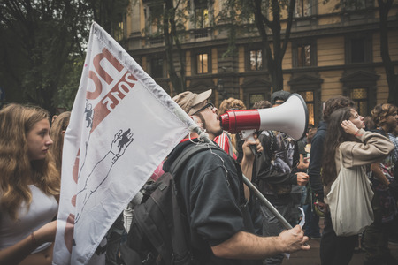 MILAN, ITALY - OCTOBER 10: Students manifestation held in Milan on October, 10 2014. Students took to the streets to protest against school italian reform and against milan expoのeditorial素材