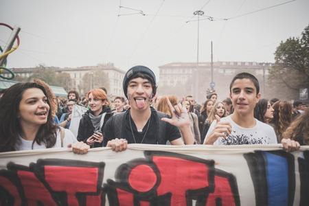 MILAN, ITALY - OCTOBER 10: Students manifestation held in Milan on October, 10 2014. Students took to the streets to protest against school italian reform and against milan expoのeditorial素材