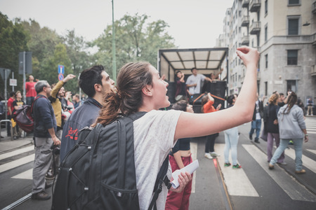 MILAN, ITALY - OCTOBER 10: Students manifestation held in Milan on October, 10 2014. Students took to the streets to protest against school italian reform and against milan expoのeditorial素材