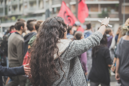 MILAN, ITALY - OCTOBER 10: Students manifestation held in Milan on October, 10 2014. Students took to the streets to protest against school italian reform and against milan expoのeditorial素材